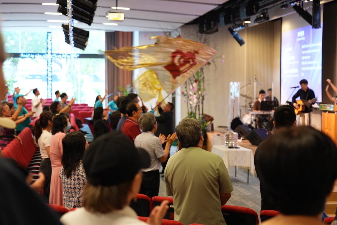 The RCC congregation worshipping together in the sanctuary